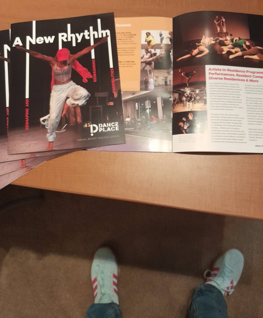 Adidas shoes and colorful publication of the annual report.
